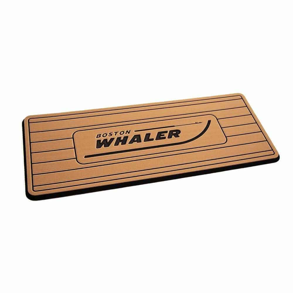 SeaDek Boston Whaler Helm Pad with mocha black brushed finish and routed teak lines for marine comfort and durability