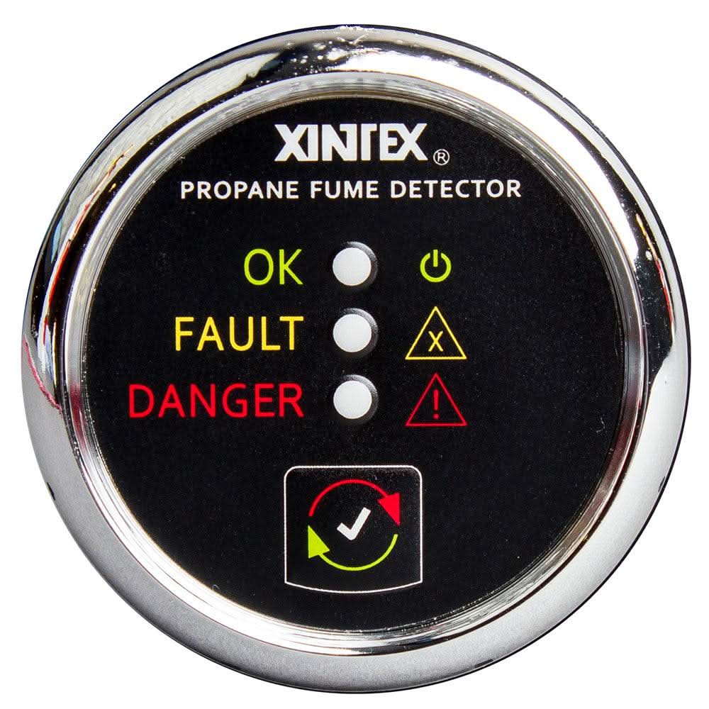 Xintex propane fume detector with chrome bezel and LED indicators showing OK, fault, and danger statuses
