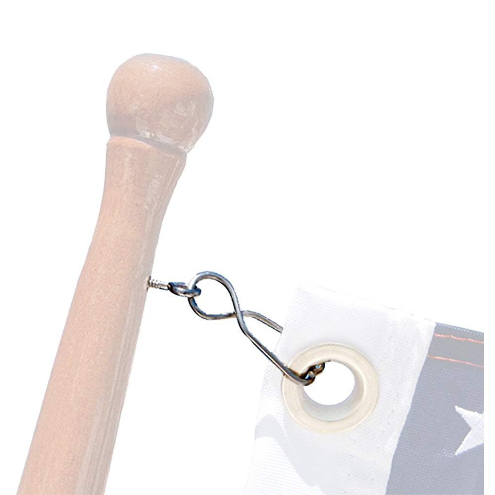 Taylor Made Skipper Flag Clip with stainless steel screw eye attached to a wooden flagpole and flag grommet