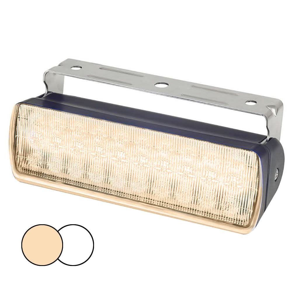 Hella Marine Sea Hawk XL dual color LED floodlight with warm white and white LEDs, black thermal polymer housing, and stainless steel bracket