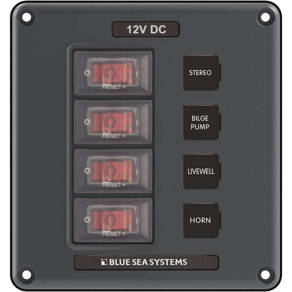 Gray Blue Sea 4320 circuit breaker switch panel with 4 illuminated positions for 12V DC systems