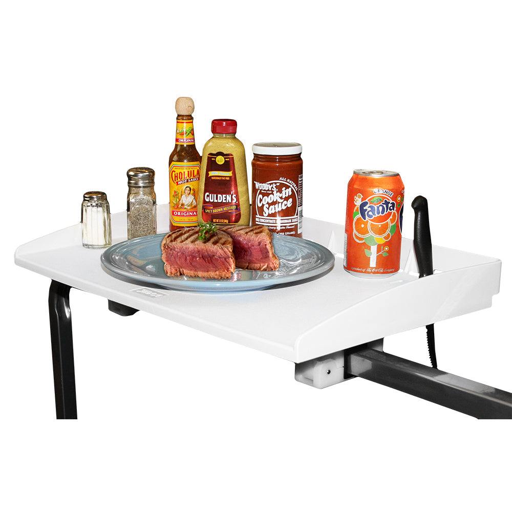 Sea-Dog Square Tube Rail Mount fillet table with mounted steak plate and condiments on white polypropylene surface