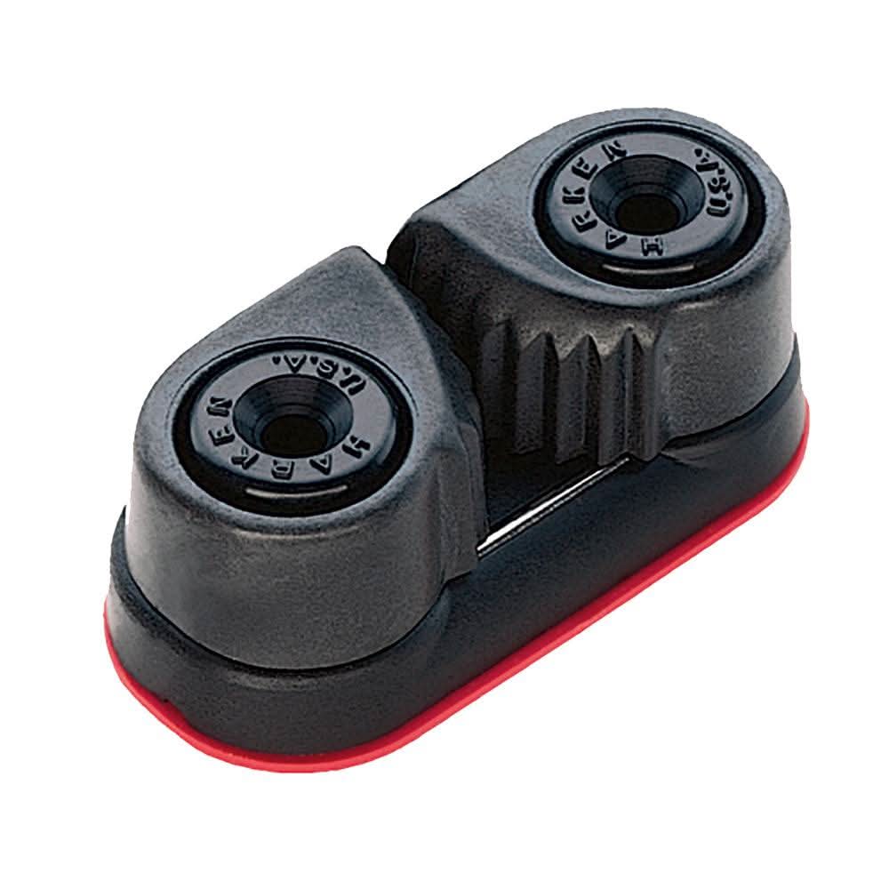 Harken Standard Carbo-Cam Cleat black fiber-reinforced lightweight sailing cleat with dual cam mechanism and red base.