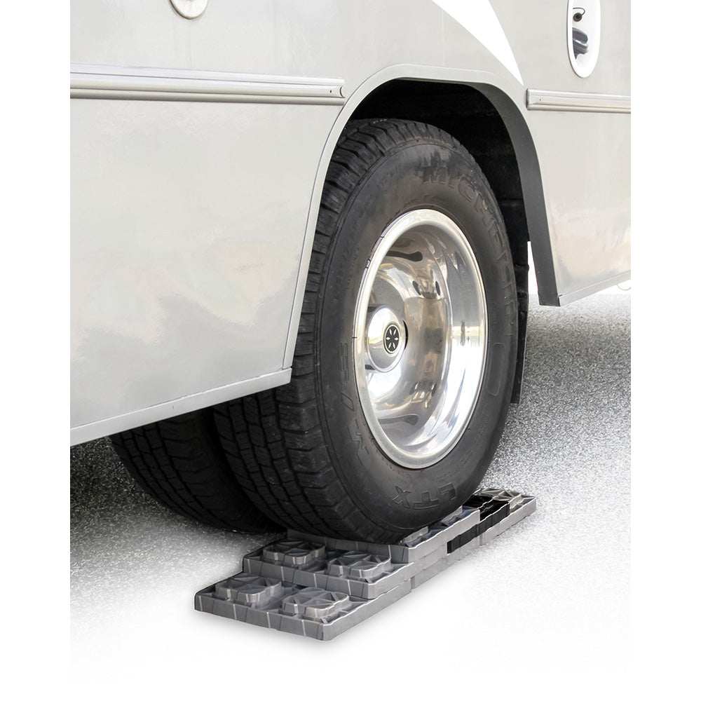 Camco FasTen Leveling Blocks XL 10-pack grey with T-handle under RV tire for stable leveling