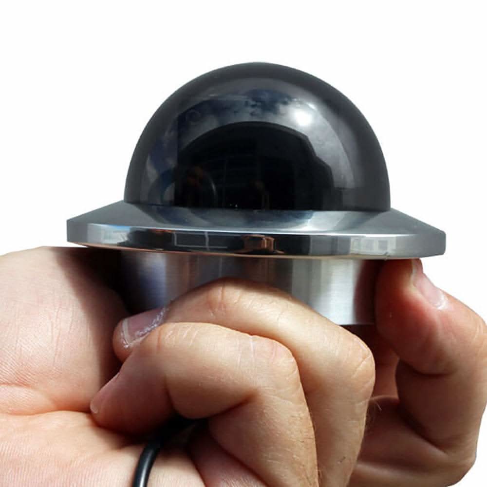 Miniature Marine PTZ Dome Camera with stainless steel bezel and 10x digital zoom in hand